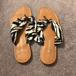 Black and white flip flops